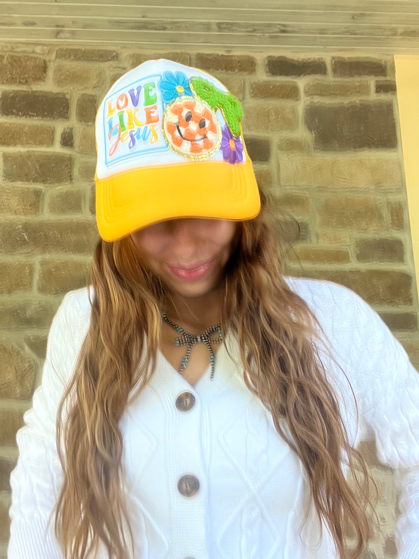 LOVE LIKE JESUS YELLOW TRUCKER HAT