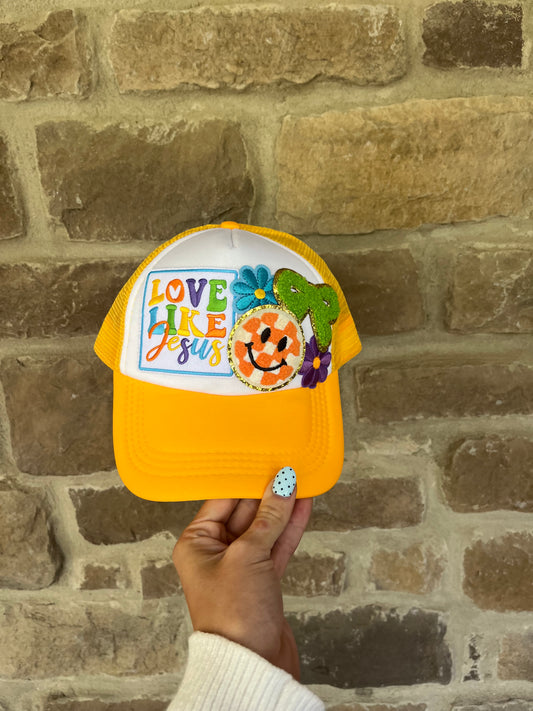LOVE LIKE JESUS YELLOW TRUCKER HAT